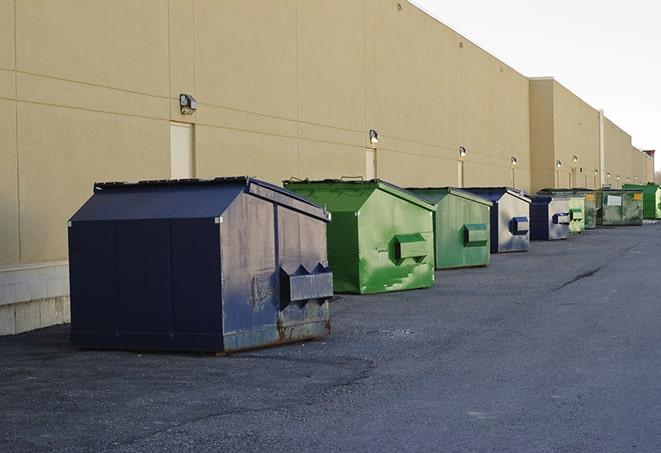 red and green waste bins at a building project in Bear Valley Springs